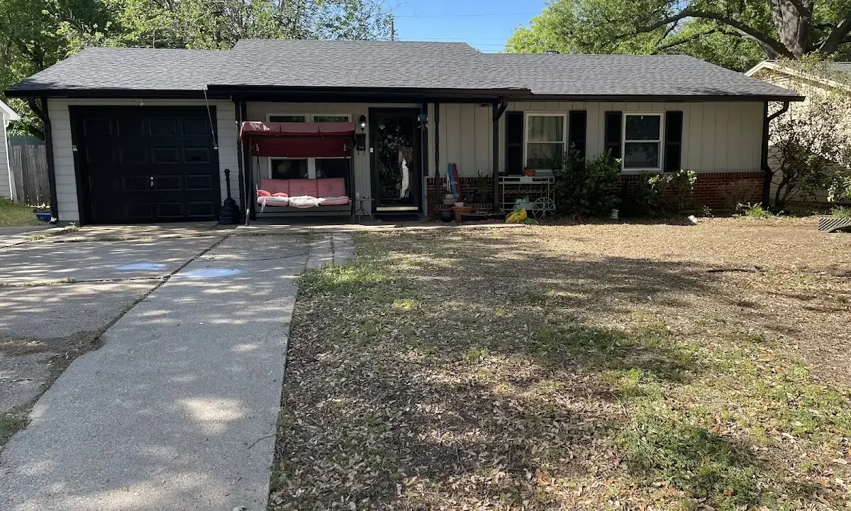 Hail Damage Roof Repair crew at work on a residential roof in Poquoson